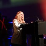 Carol Dillabough accepts the SAMMY award. Photo courtesy Syracuse Area Music Awards.